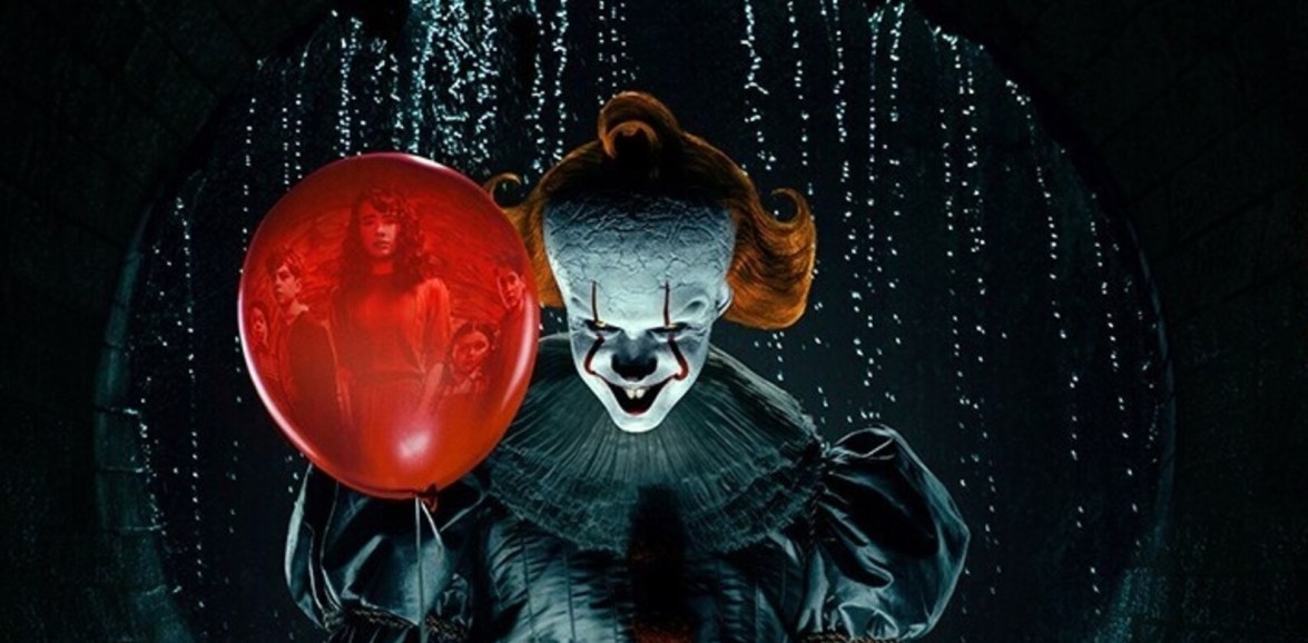 Pennywise grins beside a large red balloon reflecting frightened children against a dark, rain-streaked backdrop.