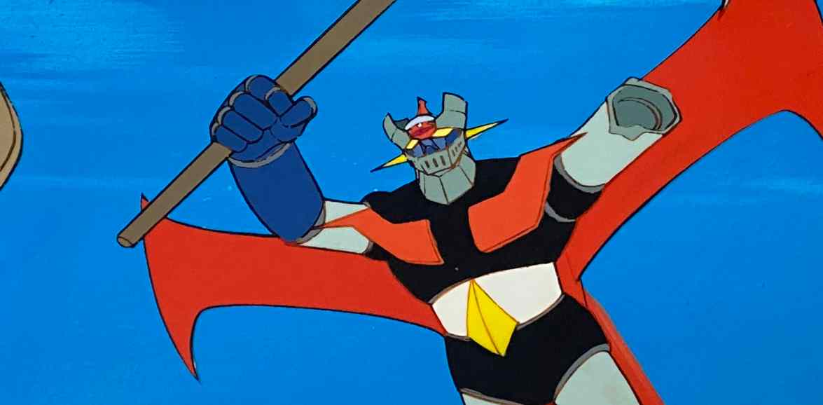 Original 1970s Mazinger Z animation of the red black and blue giant robot, featured article image.